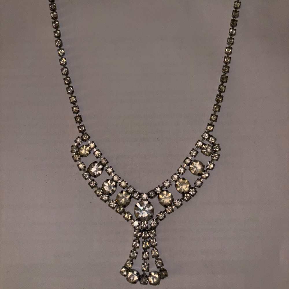 This is the fourth one of the set, vintage going out necklace